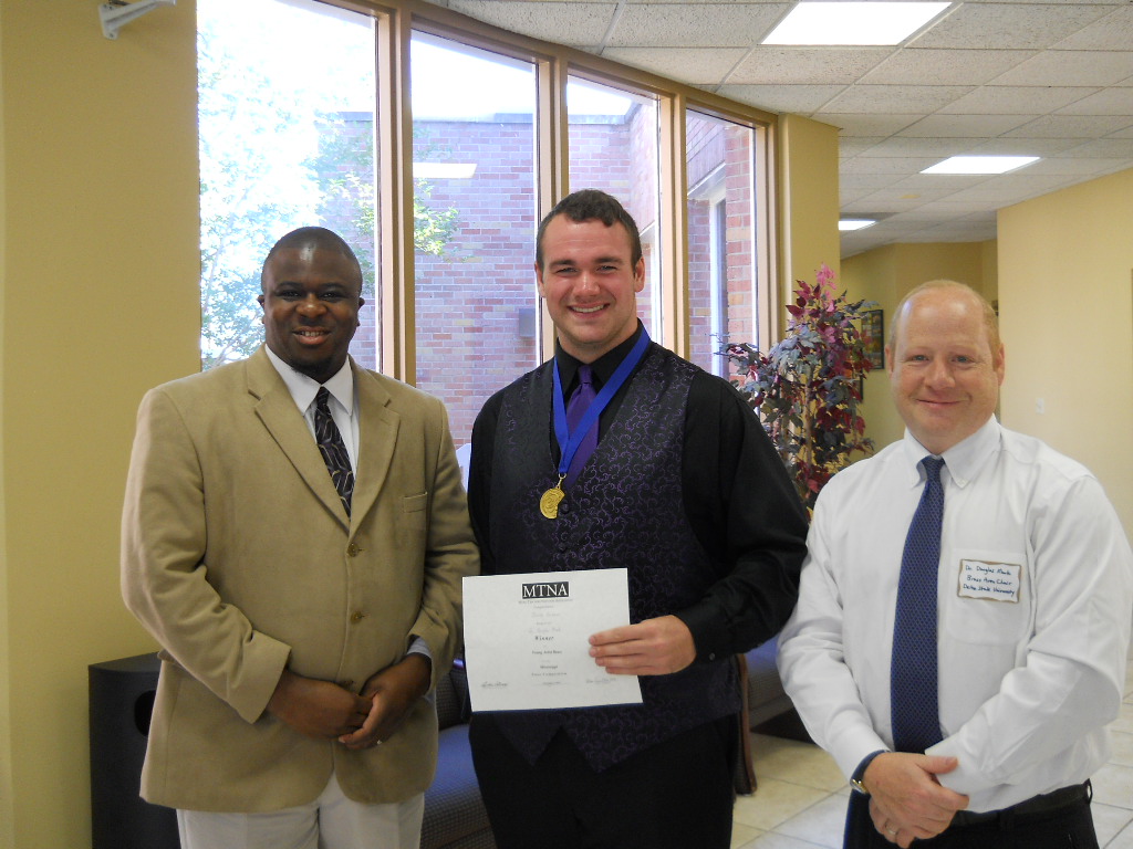 PHOTO:  From left, Dr. Eddie Elsey, Competition Judge and Professor of Low Brass at the University of North Alabama, Josiah Andrews, and Dr. Douglas Mark, MMTA Brass Competition Chair and Professor of Low Brass at Delta State University.